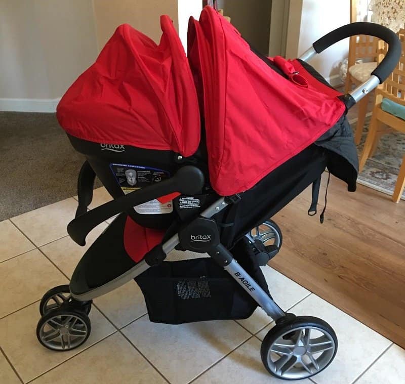 red car seat and stroller combo